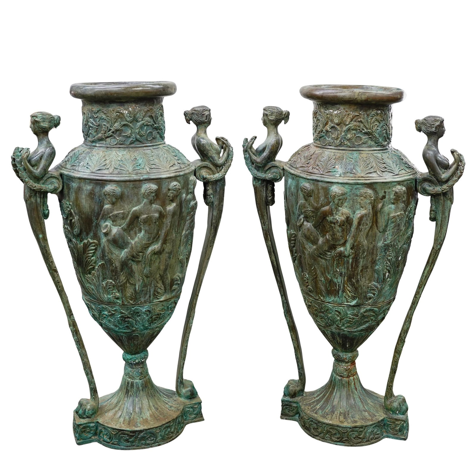 After Leonard Morel-Ladeuil Silvered Bronze Urns: DESCRIPTION: Two Neoclassical silvered bronze or jardinieres. Repousse metalworking technique styled after artist Leonard Morel-Ladeuil. Mouth opening is approx. 12.75". CIRCA: 20th century ORIGIN: Fr