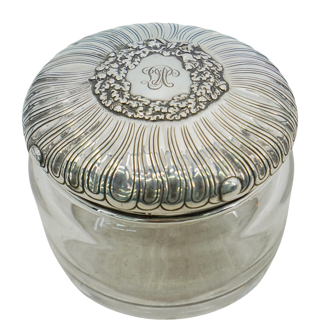Tiffany & Co. Sterling Silver and Glass Dresser Round Box: DESCRIPTION: Art Nouveau Tiffany & Co. sterling silver and glass dresser round box. The sterling silver lid is monogrammed. Marked "Tiffany & Co." and "Sterling". Sterling silver weight: 106 grams (on