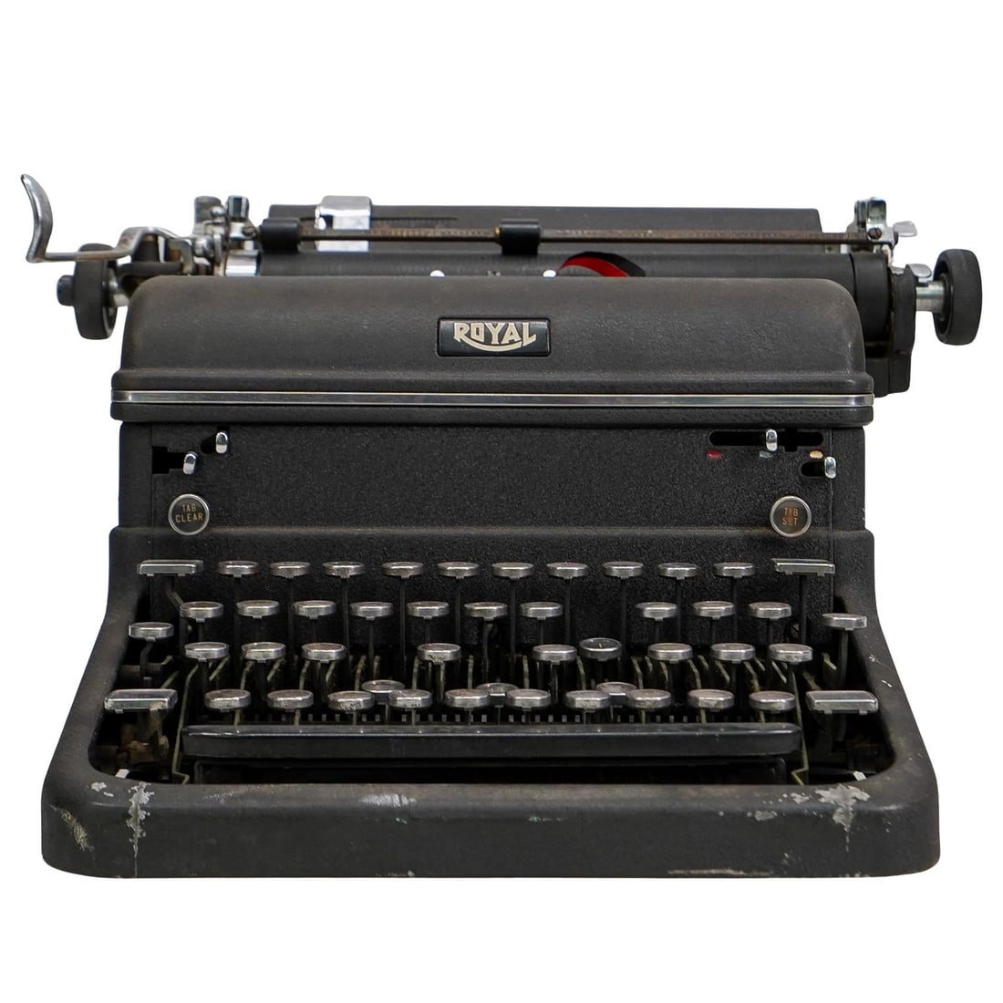 Royal Typewriter Co. Inc. Royal KMM Typewriter: DESCRIPTION: Royal Company New York typewriter in the model KMM. The KMM model stands for "magic margin", which was innovative at the time because it allowed for typists to quickly set both left and r