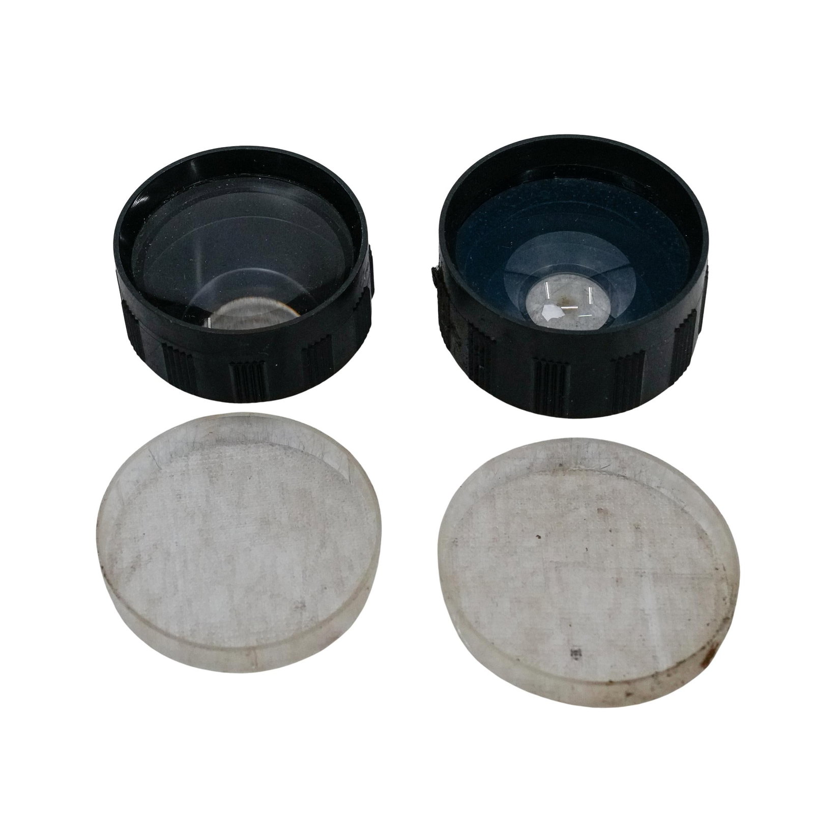 (2 pcs) Gold Crest Optiset Lens: DESCRIPTION: Gold Crest Tele Coated Lenses marked model 20, made for swingers. Come with plastic cap. One is wide lens. Made in Japan. CIRCA: 20th century ORIGIN: Japan DIMENSIONS: 1.25" x 2" CONDITIO