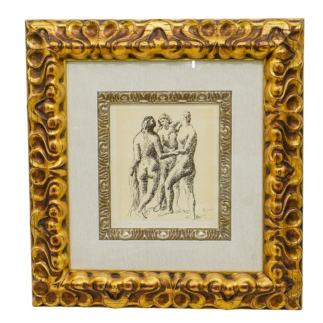 Pablo Picasso (Spanish, 1881-1973) Lithograph: DESCRIPTION: This lithograph depicts three nude figures interacting in a fluid and expressive style. The work is encased in a gilded frame. A pencil signature “Picasso” is visible in the lower