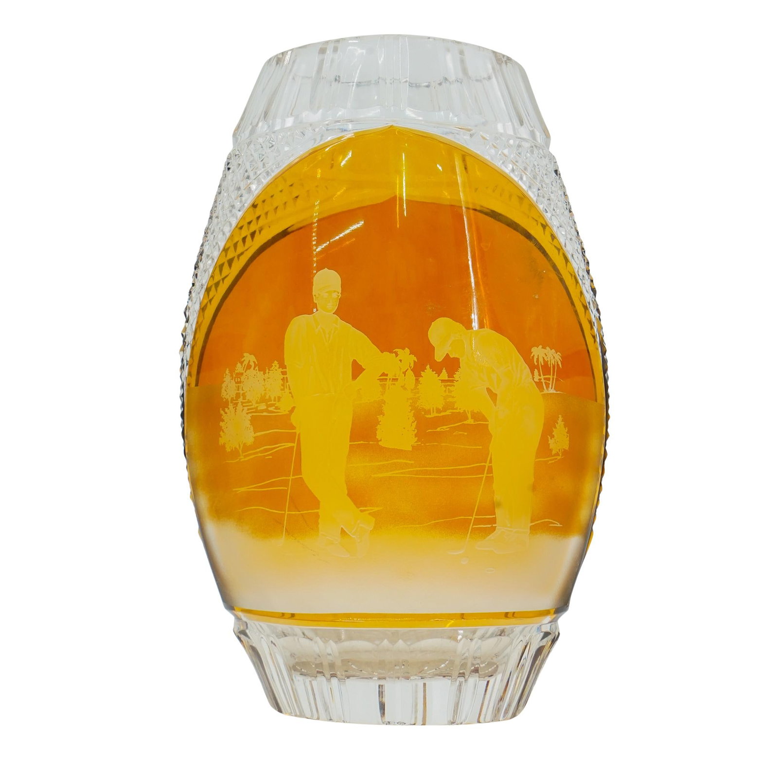 Bohemian Amber Golfer Motif Crystal Vase: DESCRIPTION: Bohemian Amber Golfer Motif Crystal Vase with cut to clear leaded glass. The vase features a rich amber hue, contrasted by intricate etching of golfers on a course. The cut-to-clear techn