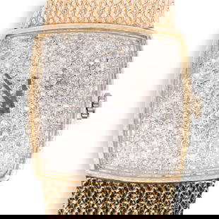 Vintage Lucien Piccard and 14k Gold Watch: DESCRIPTION: A Vintage Lucien Piccard 14k yellow gold watch features a manual wind movement, diamond inset dial weighing approx. 2.4ct diamonds, attached to a mesh bracelet. Stamped "14k", movement ma