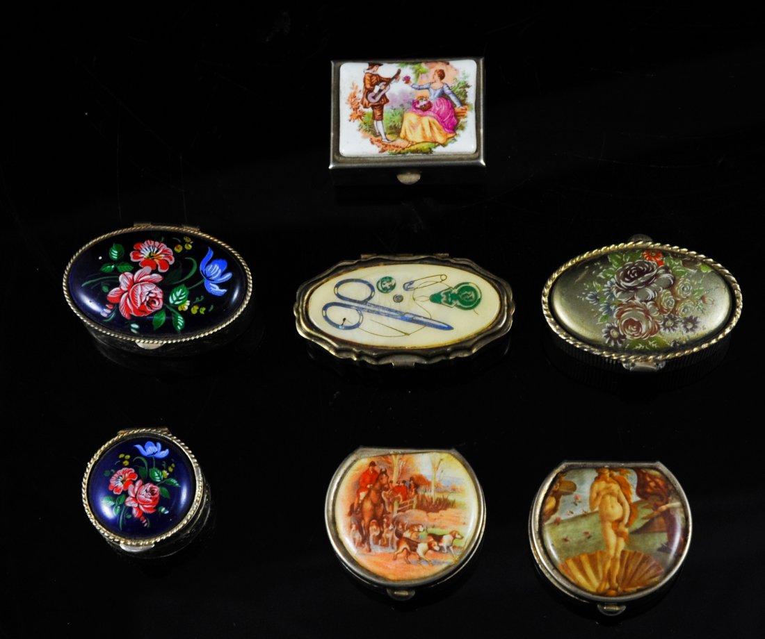 Lot of 7 miscellaneous and unique pill boxes: DESCRIPTION: Lot of 7 miscellaneous and unique pill boxes. Three have lids that are made from porcelain with floral and figural motifs, two have Victorian style transfers on both lids, one has a cellu