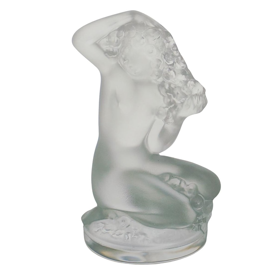 Lalique Crystal "Floreal" Figurine Paperweight: DESCRIPTION: Lalique crystal "Floreal" figurine paperweight in translucent lavender crystal depicting a seated kneeling Art Nouveau nude figure with flowers in her hair. Marked "Lalique France". CIRCA