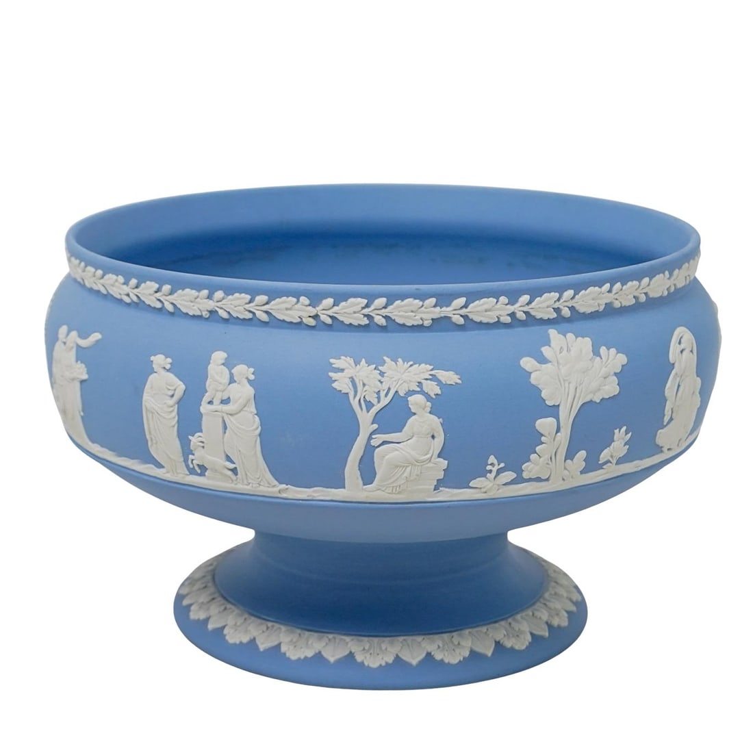 English Wedgwood "Augur's" Jasperware Pedestal Bowl: DESCRIPTION: The bowl features a stoneware matte finish. Has a classic design, with applied white figures and motifs, a laurel leaf border at the rim, and a scalloped base. It is signed "JR," "Wedgwoo