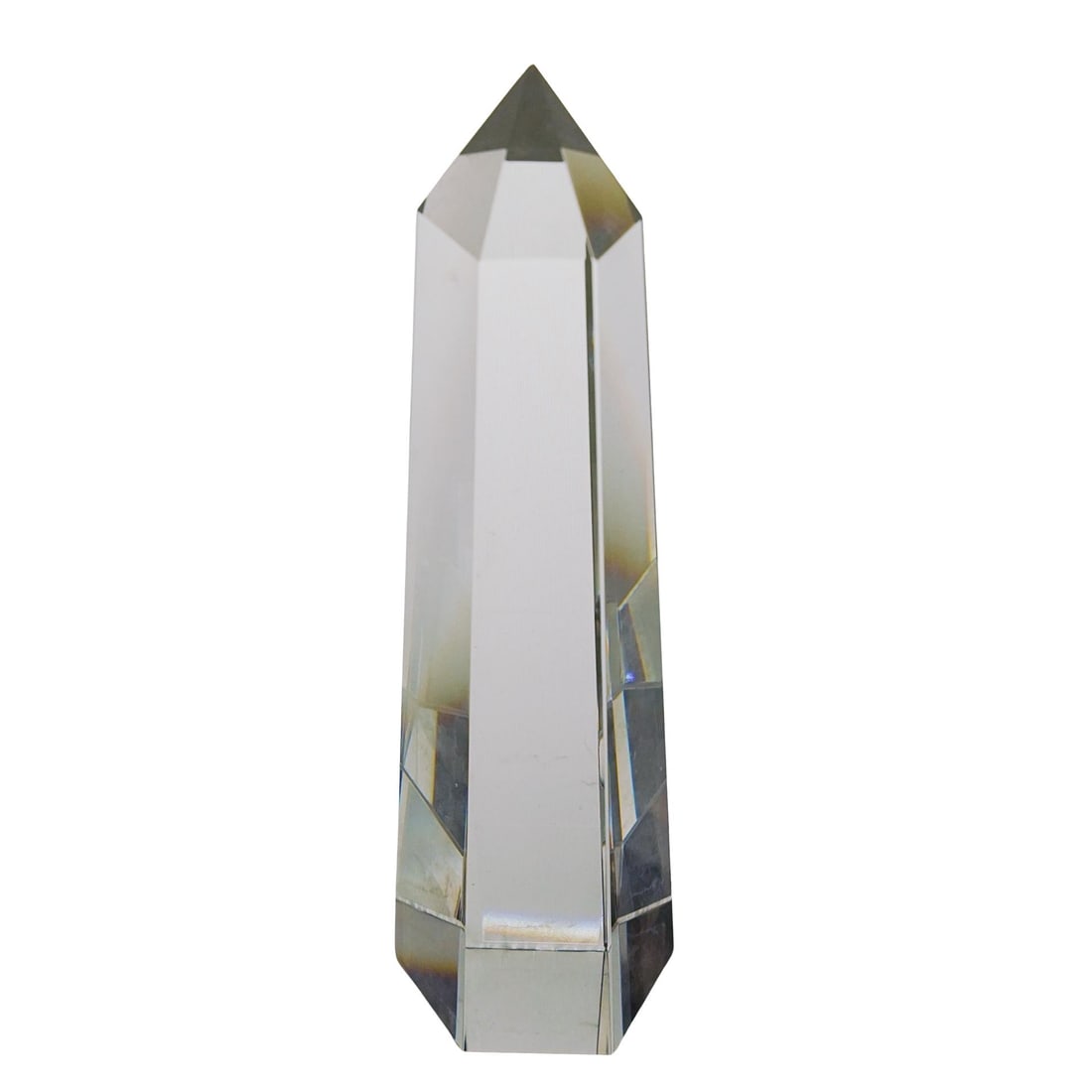 Clear Crystal Obelisk: DESCRIPTION: Clear crystal obelisk, featuring a polished, faceted design with a tapering structure that is pointed at the top. CIRCA: 20th Century ORIGIN: Continental DIMENSIONS: H: 9" W: 3" L: 3" CON