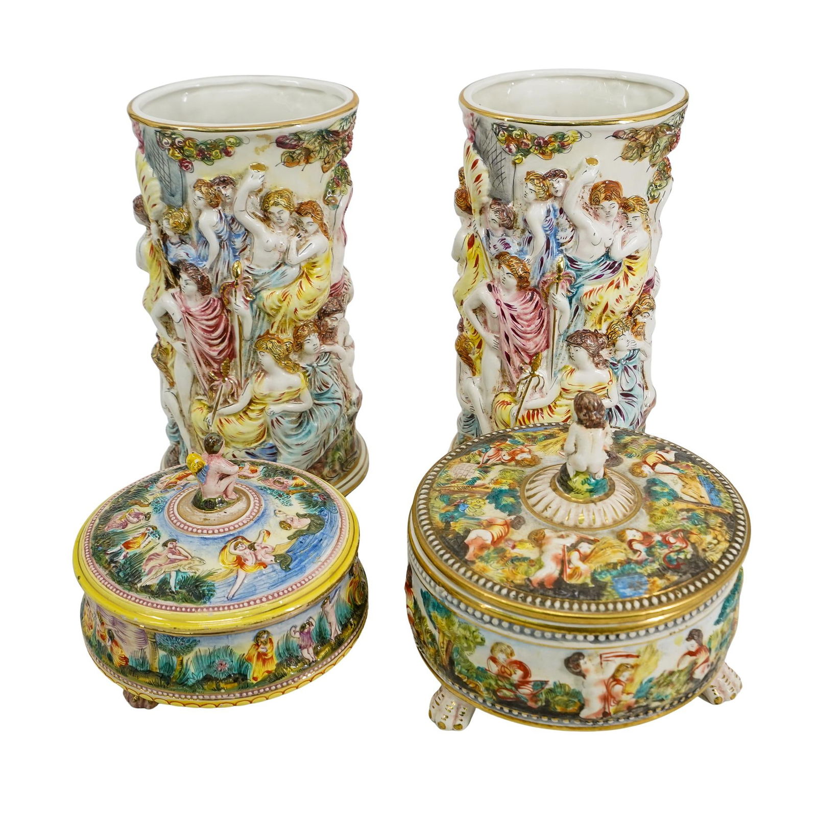 (4pc) Capodimonte Porcelain Articles: (1) DESCRIPTION: This gorgeous Capodimonte vintage vase is a true work of art, featuring a fascinating and lively embossed Roman festival scene. Colorful embossed flowers decorate the top rim, while t