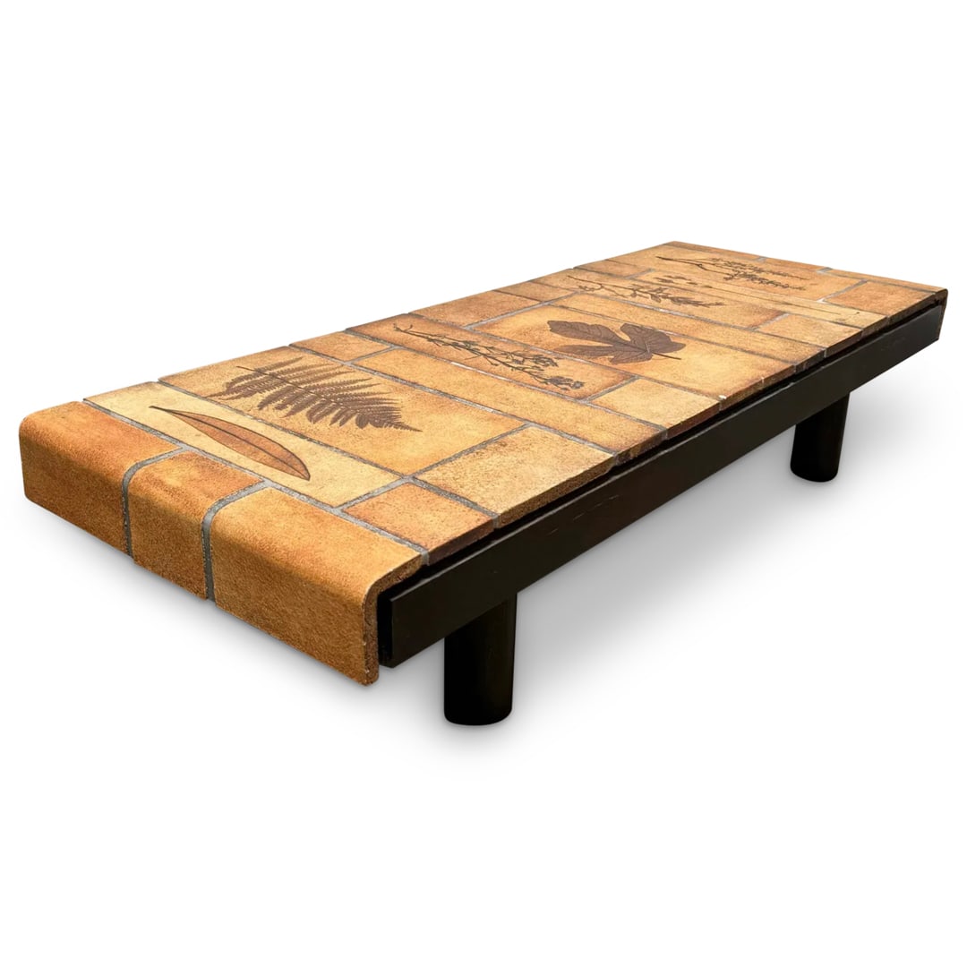 1960s Roger Capron Coffee Table with Garrigue Tiles: DESCRIPTION: Roger Capron coffee table featuring 'Garrigue' tiles - a technique in which real leaves from "lagarrigue", a variety of vegetation indigenous to southeastern France only, are pressed into