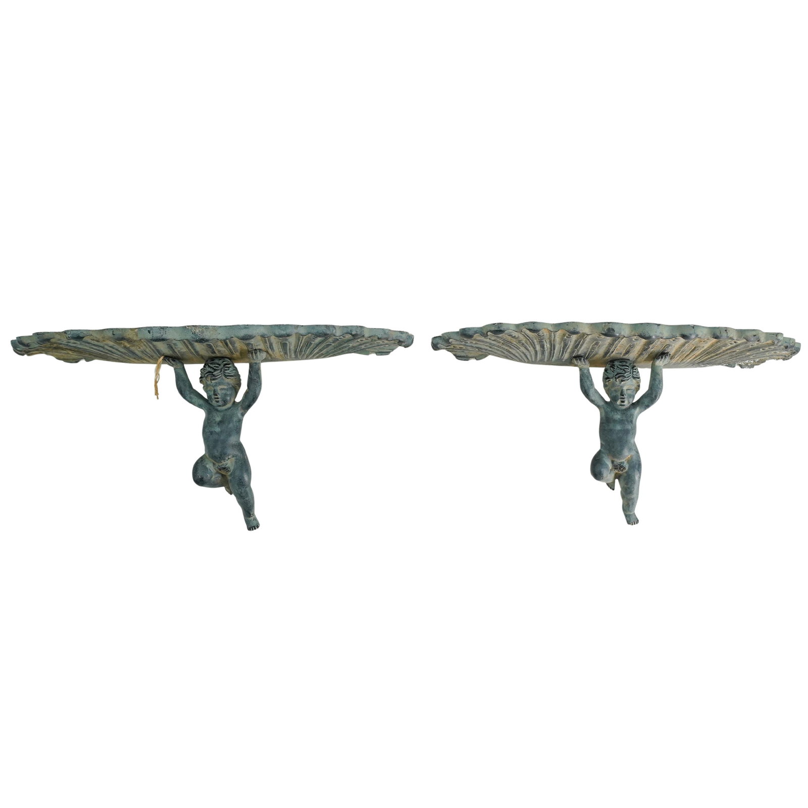 Pair of Virginia Metal Crafters Patinated Metal Wall Shelfs: DESCRIPTION: A pair of Virginia Metal Crafter wall shelfs composed of patinated metal decpting a figural putti supporting a shell formed platform. Impressed manufacture sypher. CIRCA: 20th Cent. ORIGI