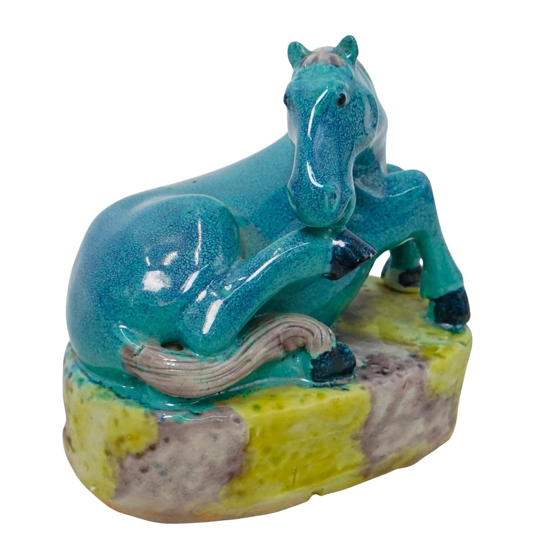 Chinese Robins Egg Blue Porcelain Recumbent Horse: DESCRIPTION: Chinese porcelain horse, in a recumbent pose, featuring a robins egg blue glaze and a sancai glaze on the base. Provenance: From a prominent dealer in Reno, Nevada. CIRCA: Late 19th to Ea