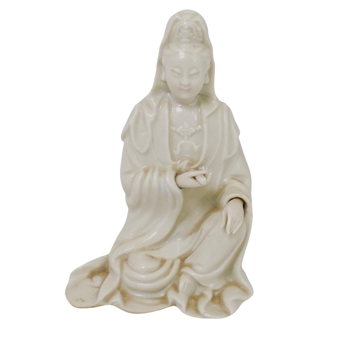 Chinese Dehua Blanc de Chine Seated Guanyin Porcelain Figurine: DESCRIPTION: Chinese Dehua Blanc de Chine porcelain figurine, depicting a seated Guanyin in a meditative pose, wearing flowing robes. Interior has painted on old collection name. Provenance: From a pr