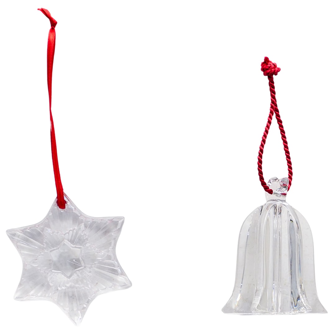 (2 Pc) Baccarat Christmas Noel Crystal Ornaments: DESCRIPTION: (2 Pc) Baccarat Christmas Noel Crystal Ornaments. In clear crystal. This set includes: one (1) Noel CCL Annual Star Ornament 2020. reference 2813874; and one (1) Noel Bell Ornament. refer