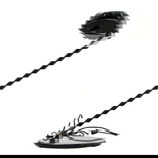 Bruno Gecchelin "Ring" Desk Lamp for Arteluce: DESCRIPTION: This desk lamp was created for the Italian company Arteluce. It has a slim, streamlined form with a curved, elongated lamp head made of metal and plastic, finished in glossy black and chr