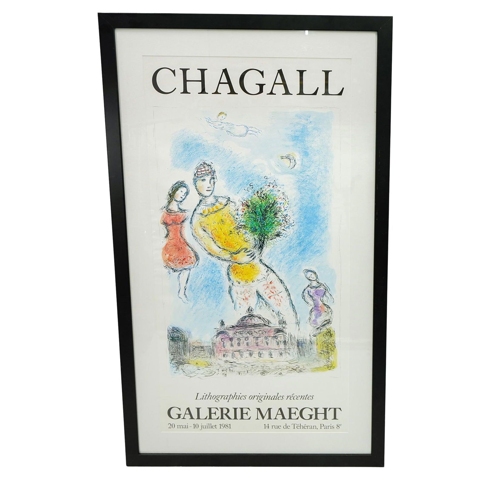 Marc Chagall (Russian and French, 1887-1985) Poster for an Exhibition: DESCRIPTION: The poster prominently displays the name "CHAGALL" at the top in bold, black letters. The artwork in the center includes figures in bright colors (yellow, red, and blue), a building, and