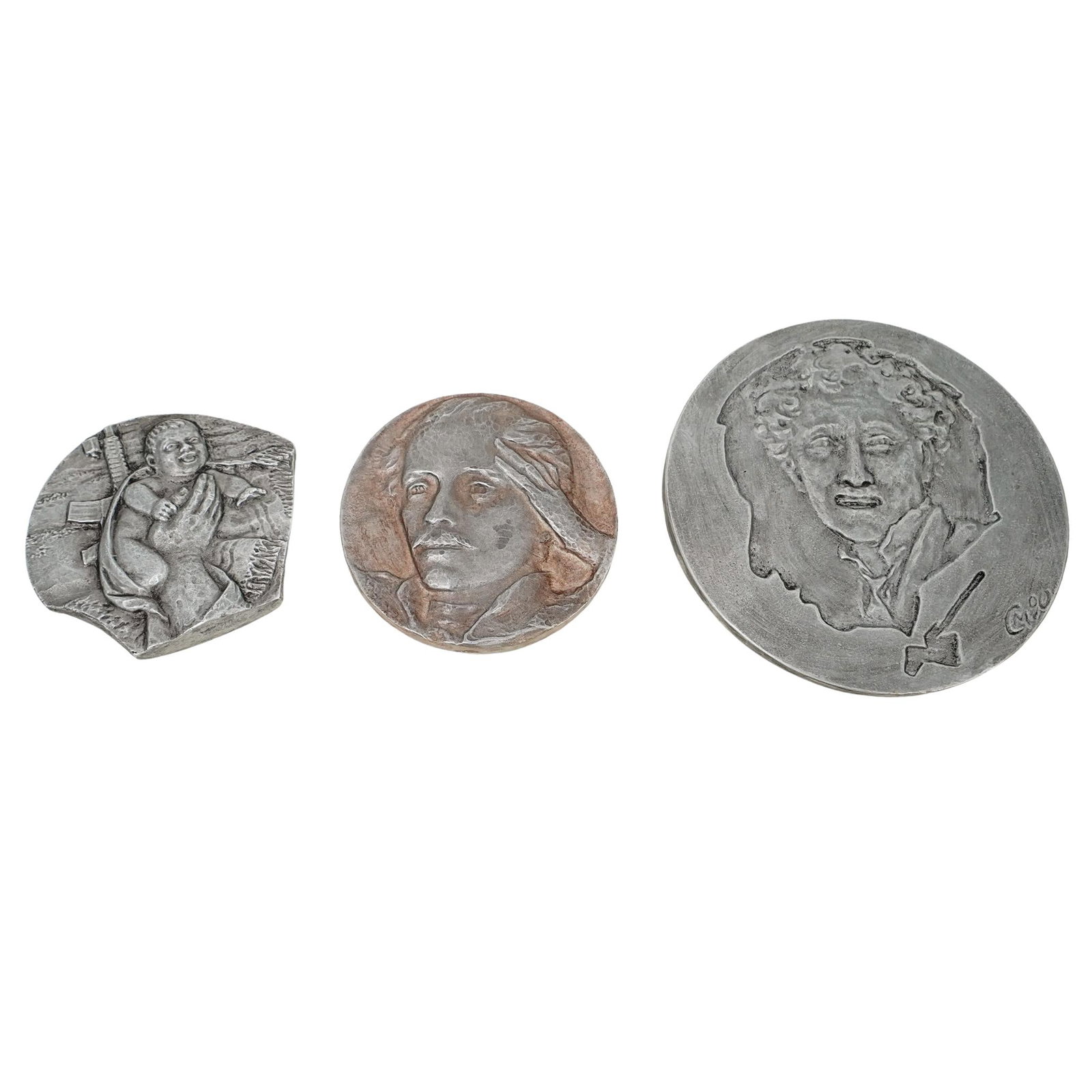 (3 pcs) Pewter Relief Medals: DESCRIPTION: x1 Large Russian Pewter Relief Medal -Front has a silhouette of a man, with Russian writing, 100, and dates 1889-1977. Back has a relief portrait of a man inside a cameo silhouette. Marke