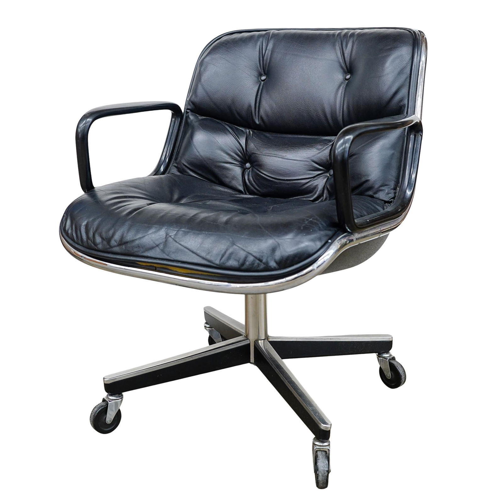 Charles Pollock For Knoll Office Leather Chair: DESCRIPTION: Upholstered in black leather with deep tufting, it features a chrome-plated steel frame with continuous rim, black molded armrests, and a sturdy four-star chrome base with casters for mob