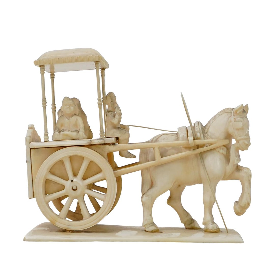 Antique Indian Carved Bone Carriage Figurine: DESCRIPTION: Carved bone figurine featuring three figures in a carriage being pulled by a horse. Provenance: Mr and Ms Castaldi, private Brooklyn estate. CIRCA: Late 19th-early 20th century ORIGIN: In