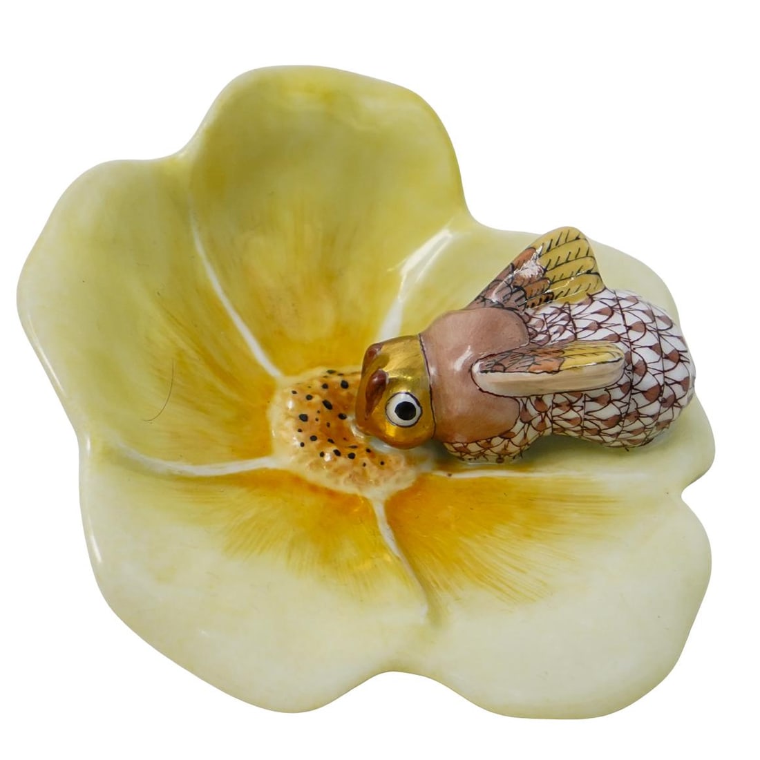 Herend Porcelain "Bumble Bee On Flower" Figurine: DESCRIPTION: Herend porcelain "Bumble Bee On Flower" figurine, depicting a bee on a yellow hued flower. Style: 9252. Marked with Herend hallmarks. CIRCA: 20th Century ORIGIN: Hungary DIMENSIONS: Lengt