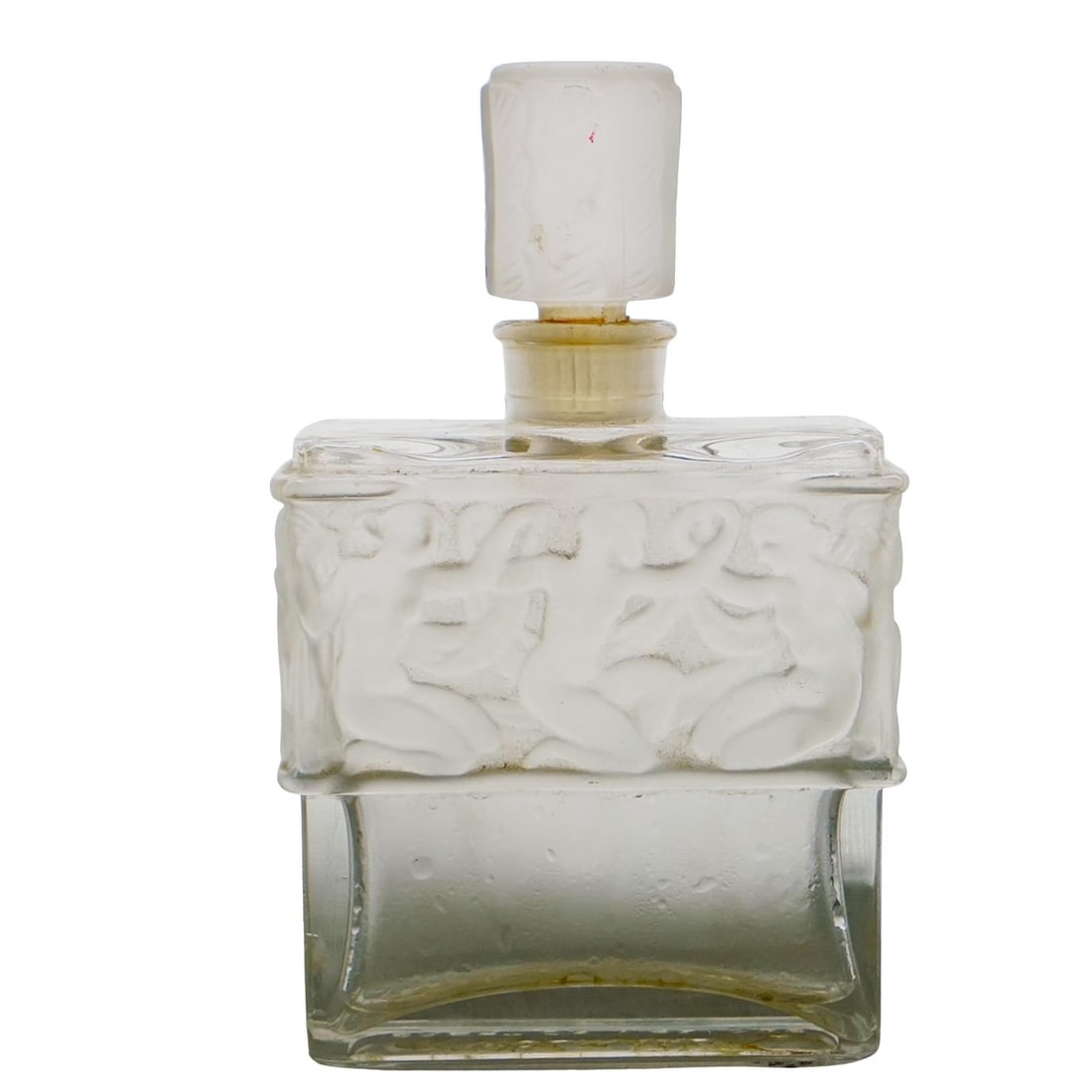 Lalique Nudes Molinard Crystal Perfume Bottle: DESCRIPTION: The bottle features a rectangular shape with intricate relief designs of nude female figures sculpted on it. It has a white frosted stopper and is made of both clear and frosted glass, wi