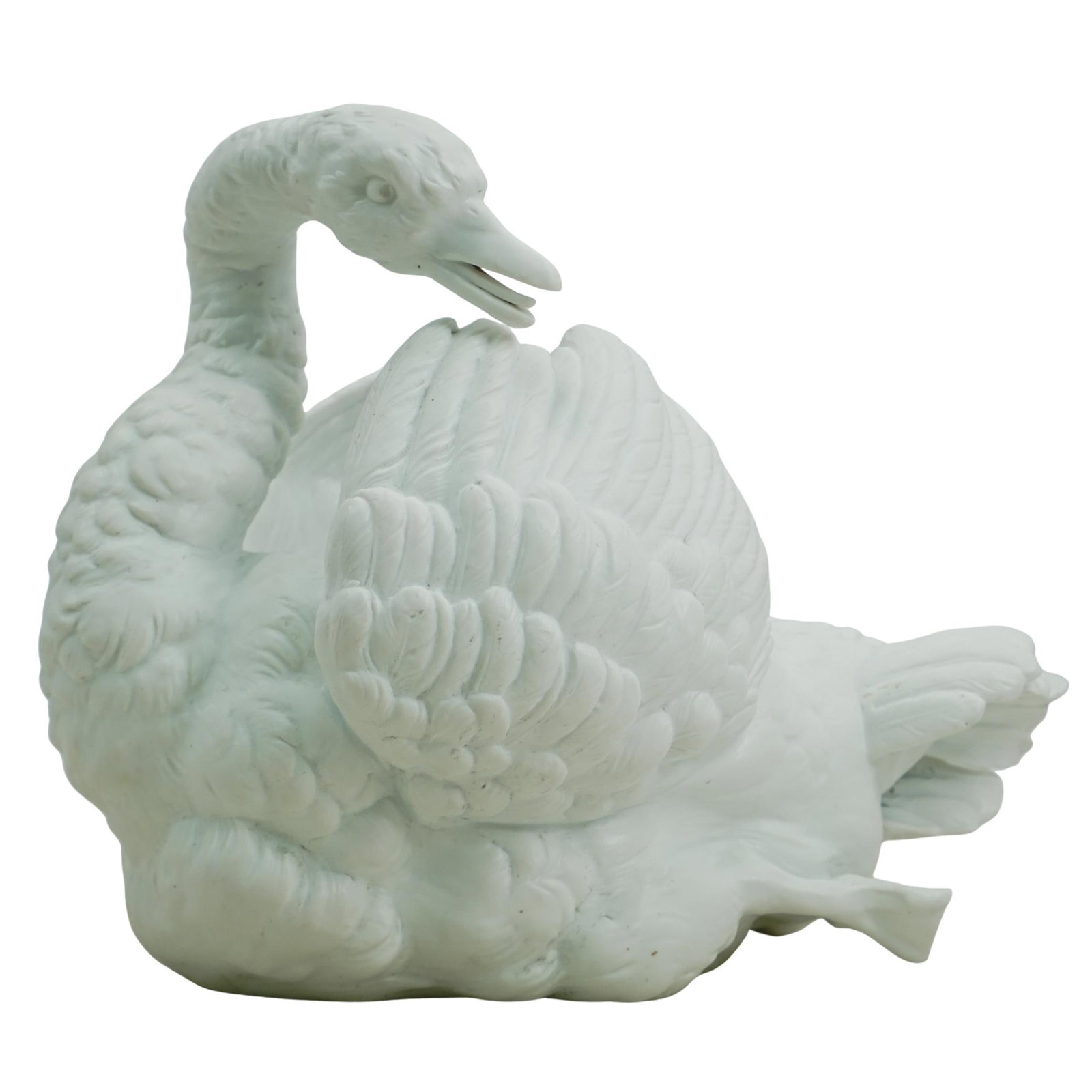 Antique French Porcelain Swan Jardiniere: DESCRIPTION: Antique French bisque porcelain jardiniere, in the form of a swan. The swan's head is gracefully turned, and the wings are raised. Incised mark underside "1295" CIRCA: 19th Century ORIGIN