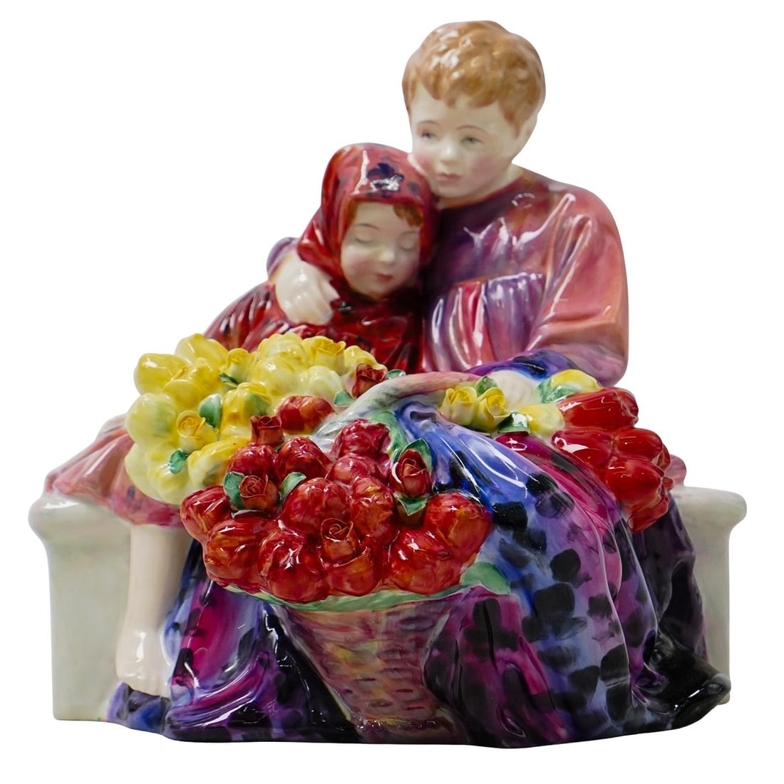 Royal Doulton "Flower Seller Children" Group Porcelain Figurine: DESCRIPTION: Royal Doulton "Flower Seller Children" Group Porcelain Figurine. Depicts a pair of children seated on a bench worth a large basket with bouquets of flowers. Marked with royal doulton stam