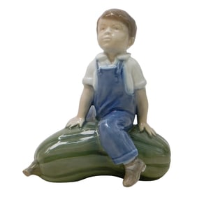 Royal Copenhagen "Little Boy Seated On Gourd" Porcelain Figurine