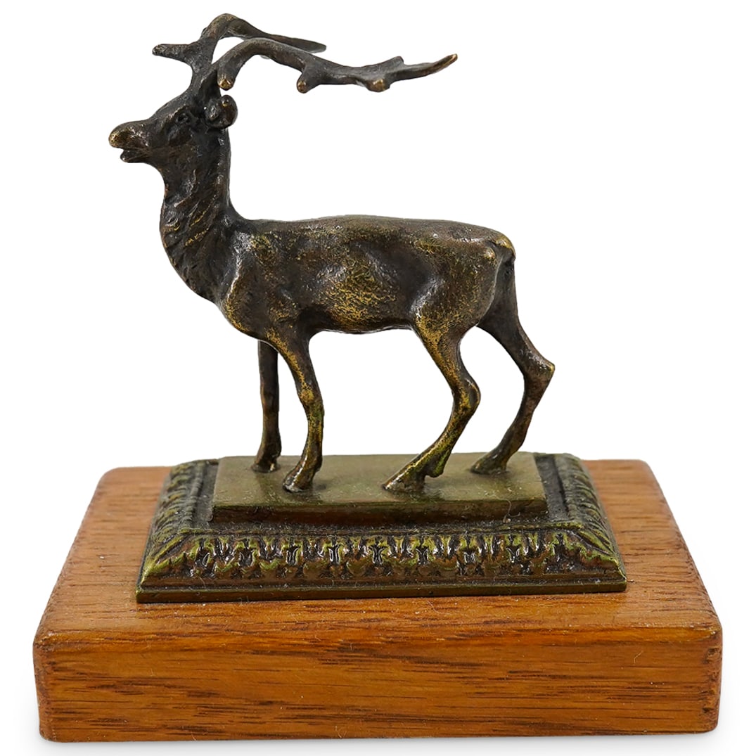 Vintage Bronze Elk Paperweight: DESCRIPTION: A vintage bronze elk figurine mounted atop a wood base. CIRCA: Early to Mid 20th Century ORIGIN: Continental DIMENSIONS: H: 3.75" W: 3.75" Depth: 2.5" CONDITION: Great condition. Unless o