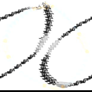 14K Gold Baroque Pearl & Black Pearl Bracelet: DESCRIPTION: Vintage 14k gold baroque pearl and black pearl beaded bracelet. Marked 14K. Total weight: 8 grs. CIRCA: 20th Century ORIGIN: Continental DIMENSIONS: L: 7" CONDITION: Good Condition Unless