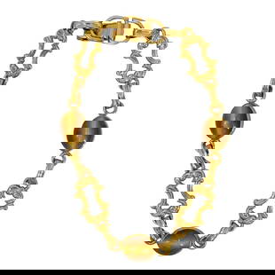 Vintage Van Dell 1970s Tiger Eye 1/20 12K Gold Filled Link Bracelet: DESCRIPTION: Vintage Van Dell 1970s Tiger Eye 1/20 12K Gold Filled Link Bracelet. Marked "Van Dell 1/20 12K GF". CIRCA: 1970s ORIGIN: USA DIMENSIONS: L: 7 1/2" . weight: 7.1 grs. CONDITION: Good pre-o