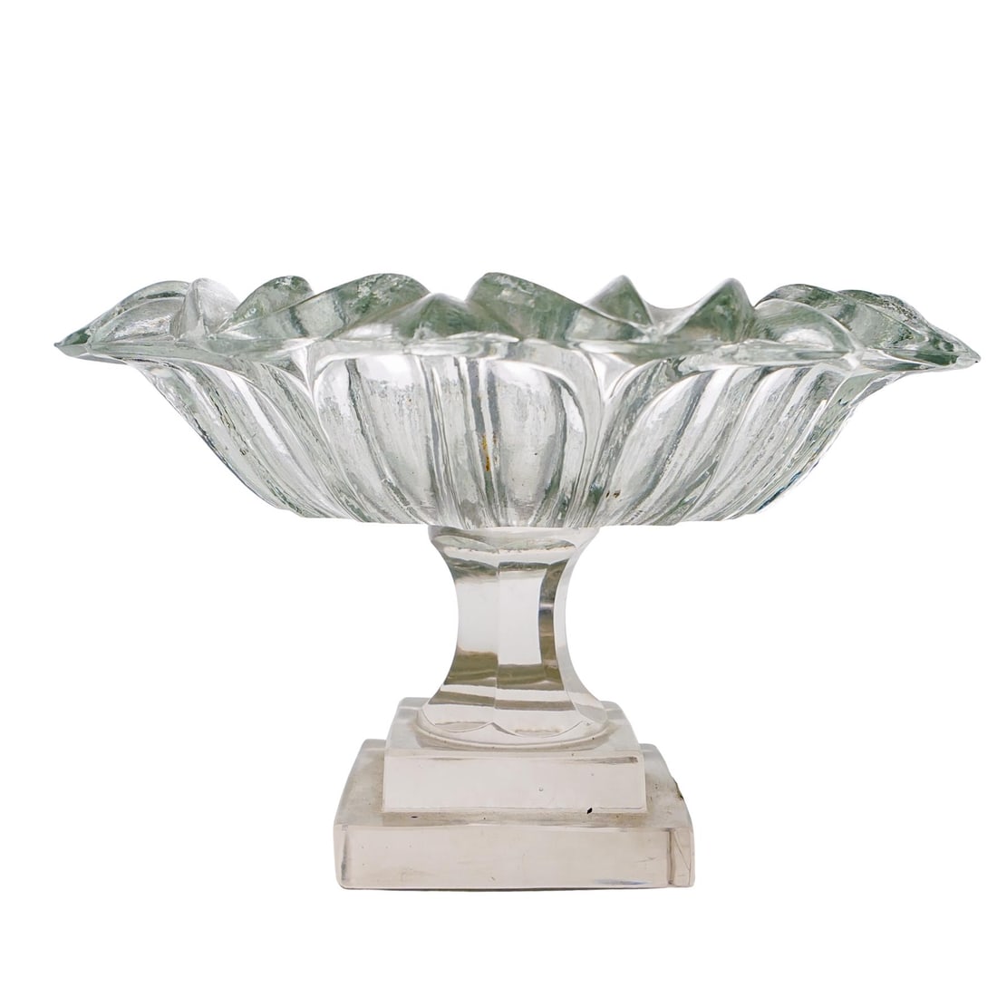 Crystal Flower Bowl on Pedestal: DESCRIPTION: A carved crystal bowl designed to look like a flower. Pedestal is made from glass. Unmarked. CIRCA: 20th century ORIGIN: Continental DIMENSIONS: H: 5 1/4" W: 8 5/8" Depth: 2 1/8" CONDITIO