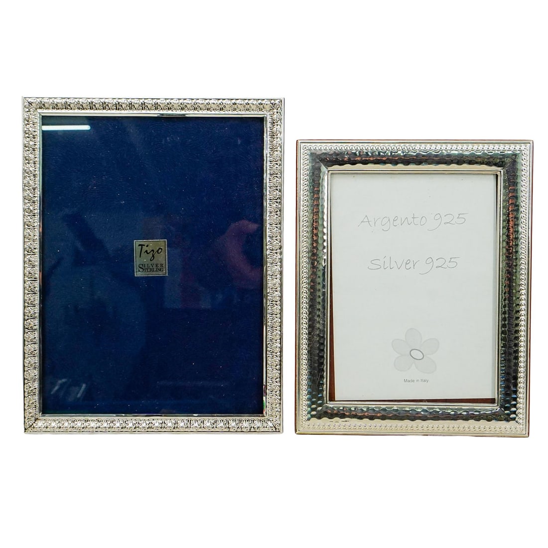 (2 Pc) Italian 925 Sterling Silver Photo Picture Frames Grouping: DESCRIPTION: (2 Pc) Italian 925 Sterling Silver Photo Picture Frames Grouping. This set includes a total of two (2) sterling silver photo frames with wooden folding stands, from brands: Tizo, and Arge