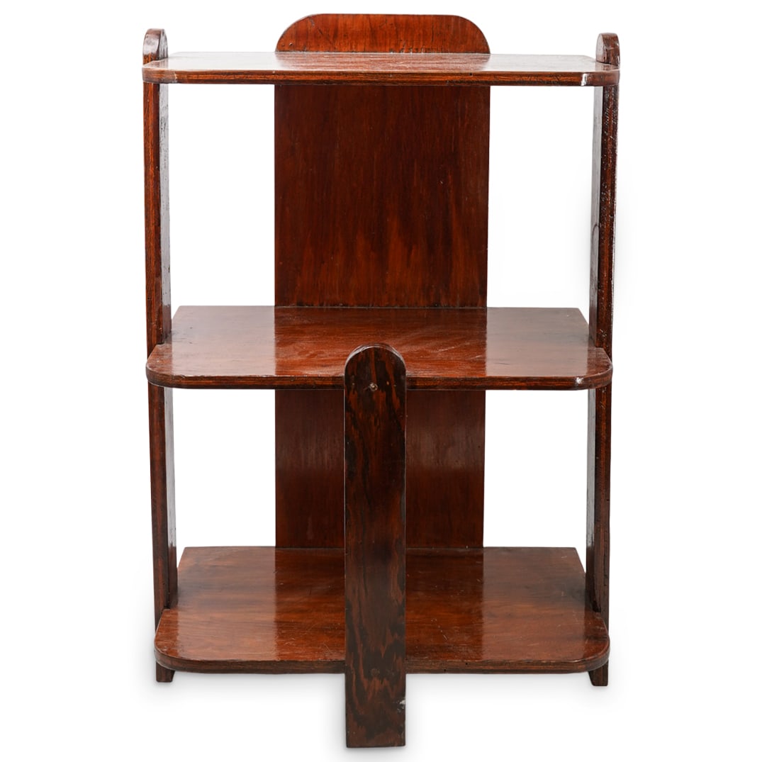 Art Deco Triple Tiered Wooden Bookstand: DESCRIPTION: Art Deco hand made triple tiered wooden stand, featuring curved edges on the shelves and a simple and functional design. CIRCA: Early 20th Century ORIGIN: USA DIMENSIONS: H: 31" W: 12.5" 