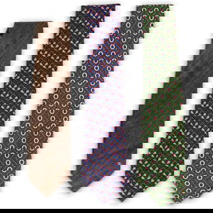 (3 Pcs) Chanel Silk Necktie Group: DESCRIPTION: (3 pcs) Chanel grouping of silk and wool ties in assorted solid and patterned colors. Each tie with "Chanel" Paris logo label. (Ref. A020). CIRCA: 20th Century ORIGIN: Italy DIMENSIONS: A