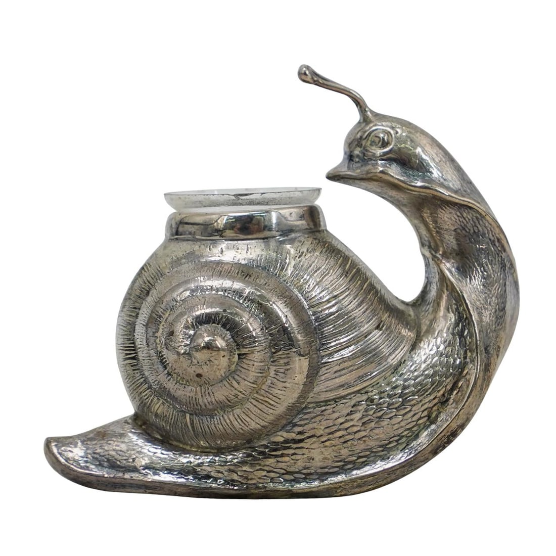 Camusso Sterling Silver Snail Salt Cellar: DESCRIPTION: Camusso Silver Company sterling silver salt cellar carved to look like a snail. Cellar part is a glass tube structure that sits in the shell component. Marked on bottom "Sterling 925 Camu