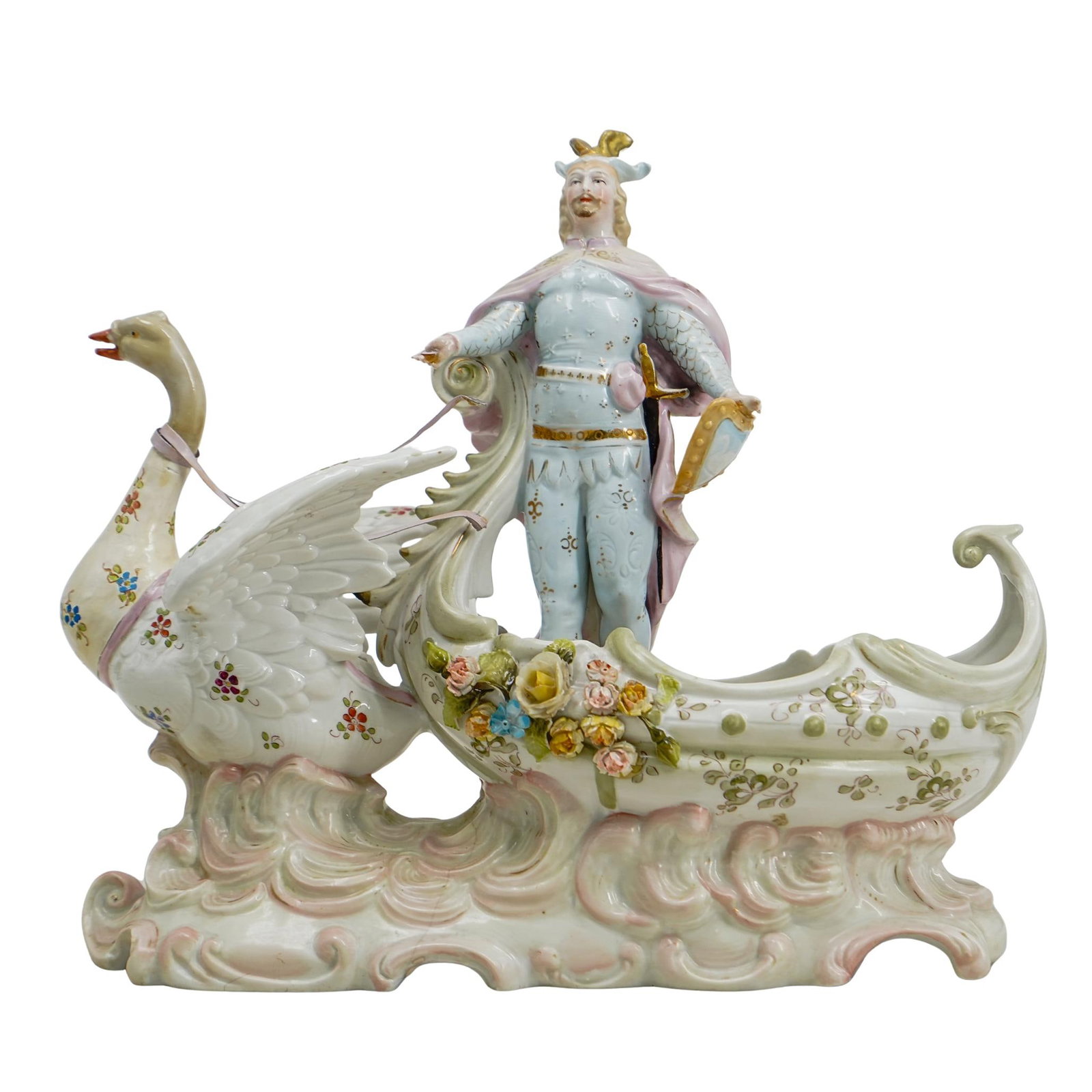 Antique Porcelain Swan Chariot Figurine: DESCRIPTION: Hand-painted porcelain figure of a swan chariot being pulled by a viking. Carved floral and gilt accents throughout. CIRCA: 19th-20th century ORIGIN: Europe DIMENSIONS: H: 9 3/8" W: 4 1/4