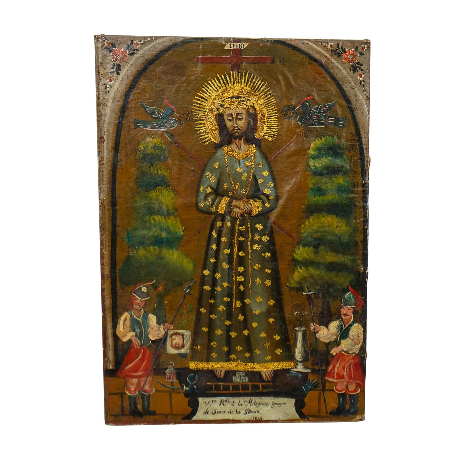 19th Century Latin American Oil On Canvas Religious Painting: DESCRIPTION: 19th century Latin American oil on canvas painting, depicting Jesus Christ with his hands bound, wearing a long, richly decorated robe and headpiece. Above his head is the inscription "IN