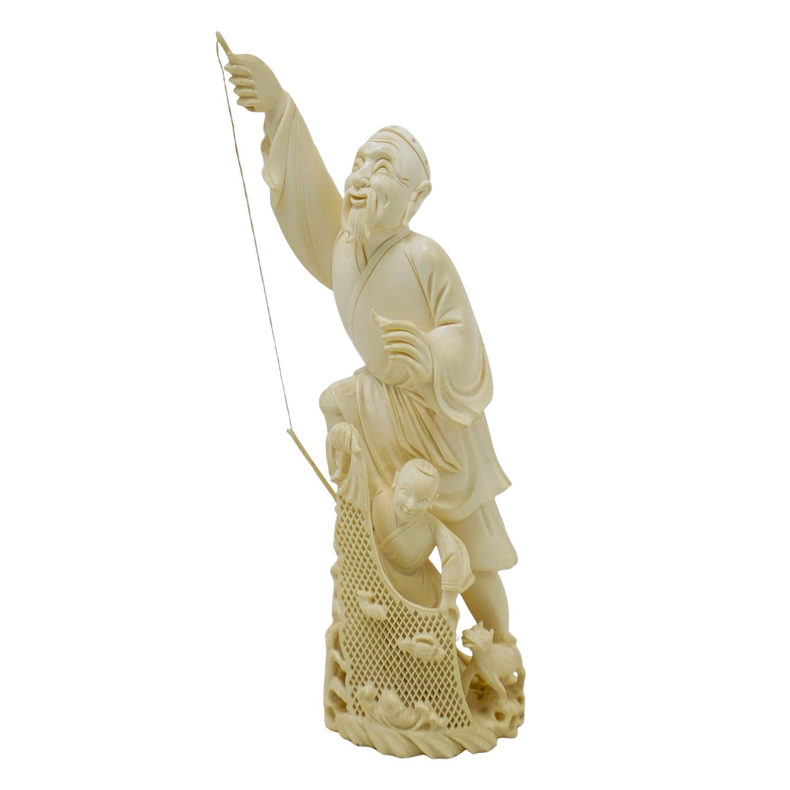 Japanese Carved Bone Fisherman Figurine: DESCRIPTION: Carved bone figurine featuring two fisherman with a stringed fishing pole. Detailed carved netting element at the front. Small fish and a dog carving around base as well as carved waves a
