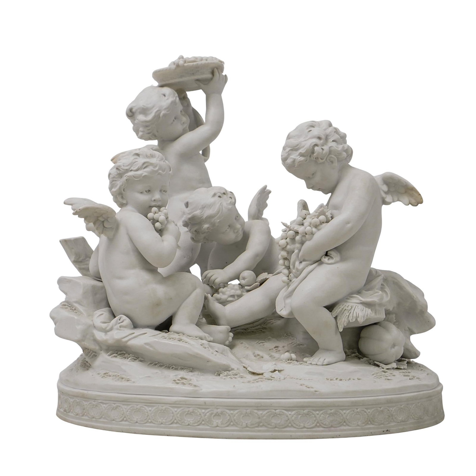 Att. F. Greiner Porcelain Sculpture: DESCRIPTION: Classical depiction of four cherubs with harvested grapes. Attributed to F. Greiner. Porcelain. Marked with an "R" mark on bottom dated 1762. CIRCA: Germany ORIGIN: 18th century DIMENSION