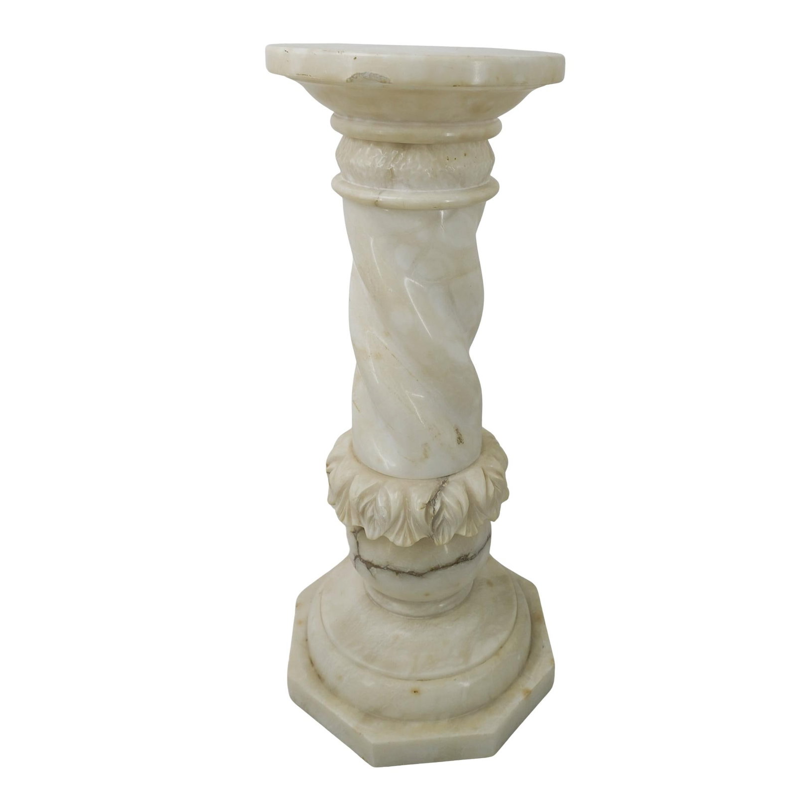 Italian Carved Marble Pedestal: Italian Carved Marble Pedestal 20th century, Italy This carved marble pedestal has a round top with a smooth, polished surface, supported by a twisted column adorned with intricate carved details. The