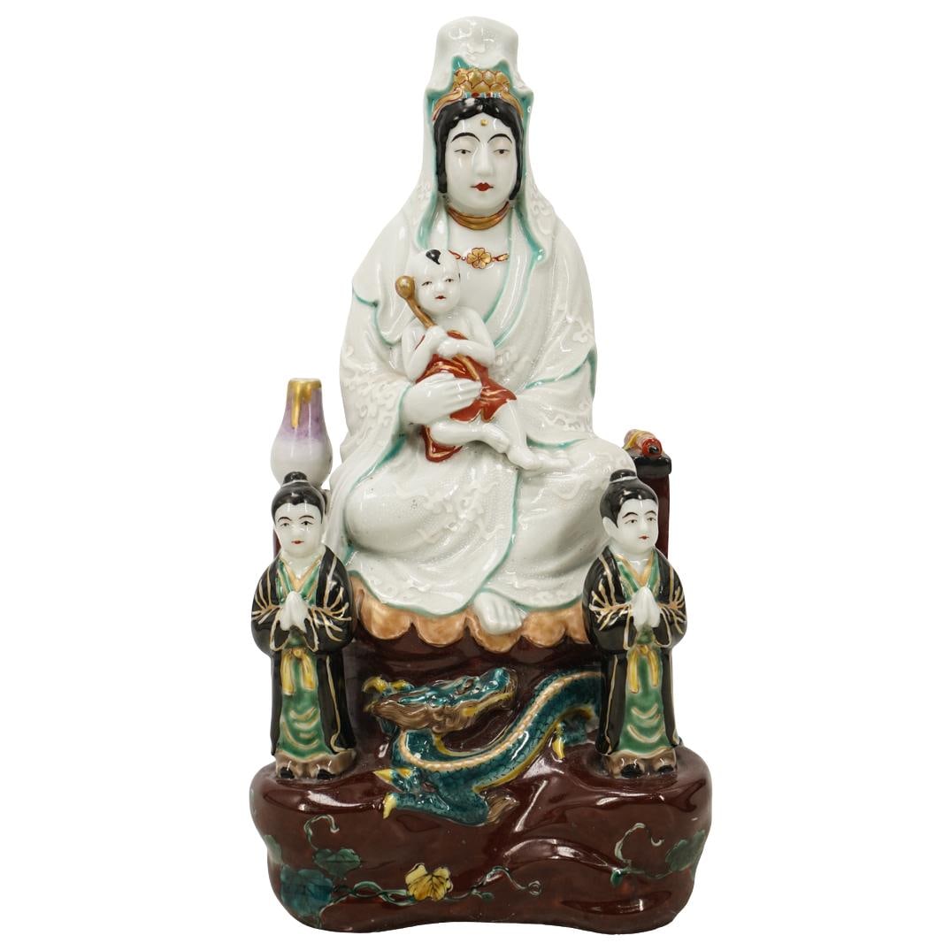 Japanese Kutani Porcelain Kannon With Child Figure: Japanese Kutani Porcelain Kannon With Child Figure Late 19th to Early 20th Century, Japan Japanese kutani porcelain figure, depicting goddess Kannon dressed in flowing, white and pastel green robes wi