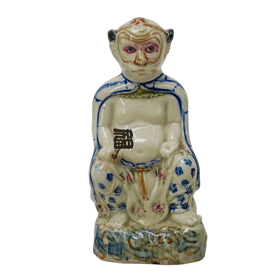Chinese Qing Dynasty Monkey Porcelain Figure: Chinese Qing Dynasty Monkey Porcelain Figure 19th Century, China Chinese Qing dynasty era porcelain figure, depicting a creature that resembles a monkey dressed in human like attire; floral patterned 