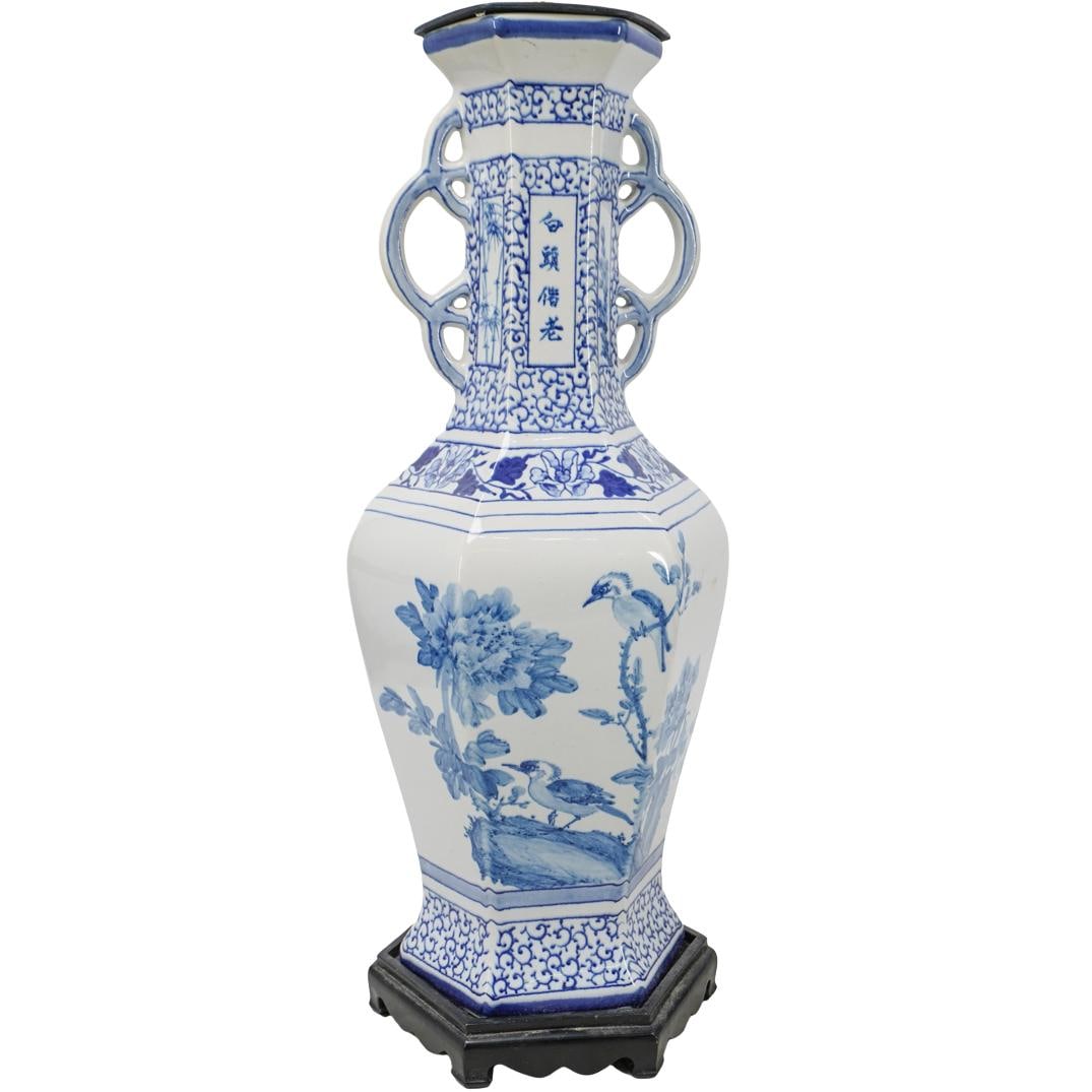 Chinese Blue and White Hexagonal Porcelain Lamp: Chinese Blue and White Hexagonal Porcelain Lamp Late 20th Century, China Chinese blue and white porcelain lamp, fashioned from a hexagonal vase and mounted to a carved wood base. The body has a tall, 