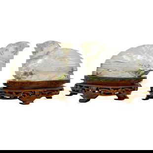 Pair Of Chinese Carved Rock Crystal Quail Boxes: Pair Of Chinese Carved Rock Crystal Quail BoxesLate 19th to Early 20th Century, ChinaPair of Chinese carved rock crystal quail boxes, sitting atop carved wood stands.H: 2.75" W: 1.75" L: 3"