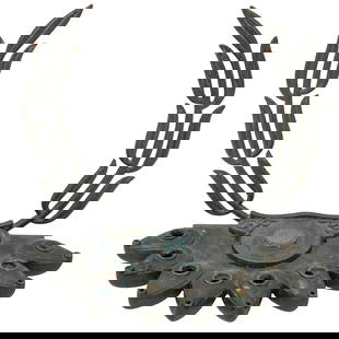 B. Shechter Israeli Brass Menorah: B. Shechter Israeli Brass MenorahMid-20th century, IsraelThis is a vintage brass Hanukkah menorah, designed and produced by B. Shechter in Israel. The base features nine spouts resembling teardrop-sha