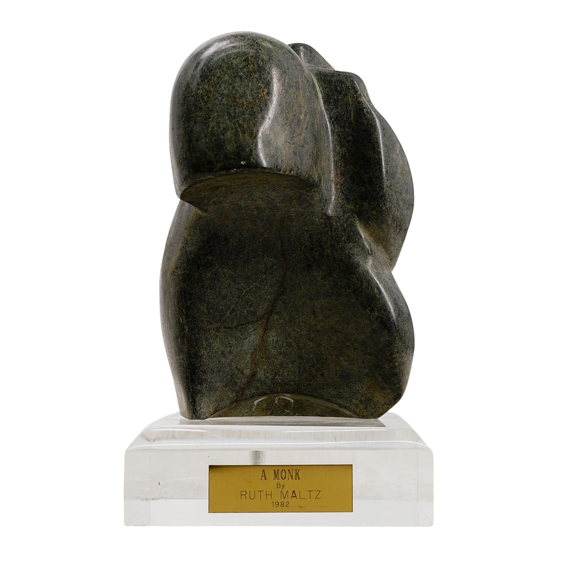 Ruth Maltz Modernist Marble Sculpture of a Monk: Ruth Maltz Modernist Marble Sculpture of a Monk1982, USAThis modernist sculpture presents a highly abstract, minimalist form carved from a smooth, dark-toned stone (marble). It's mounted on a clear, r