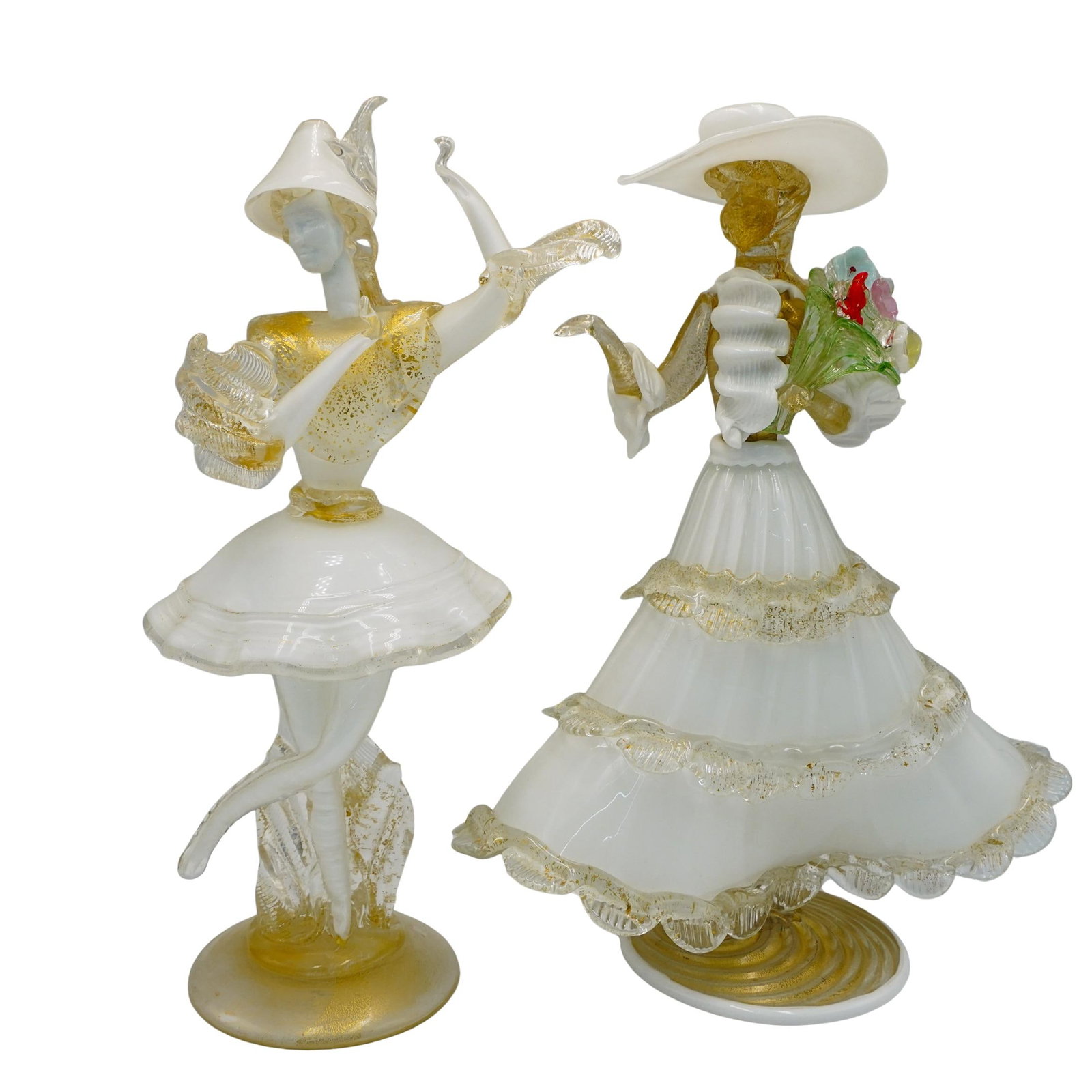 Pair of Venetian Glass Figurines: Pair of Venetian Glass Figurines 20th century, Italy Pair of Murano Glass Figurines – Dancer and Lady with Flowers. The Dancer: She wears a short, flared white skirt with clear ruffled edges, a gold