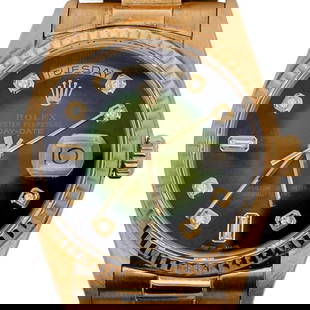 Vintage Rolex Day Date 18k Gold Tropical Green Dial Watch REF#18038: Vintage Rolex Day Date 18k Gold Tropical Green Dial Watch REF#180381984, SwissA Rolex day date features an automatic movement, 18k yellow gold case, tropical green dial, presidential bracelet, scratch