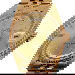 Vintage Rolex Day Date 18k Gold and Gold Dial Watch REF#1802: Vintage Rolex Day Date 18k Gold and Gold Dial Watch REF#18021969, SwissA Rolex day date features an automatic movement, 18k yellow gold case, gold dial, presidential bracelet, scratch resistant sapphi
