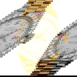 Rolex 18k Gold Diamond and Ruby Datejust Ladies Watch: Rolex 18k Gold Diamond and Ruby Datejust Ladies Watch20th Century, SwissRolex 18k gold ladies Oyster Perpetual Datejust watch, featuring silver toned dial with diamond hour markers, gold hands, factor